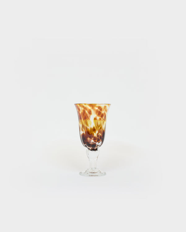 Le verre à pied terre mêlée