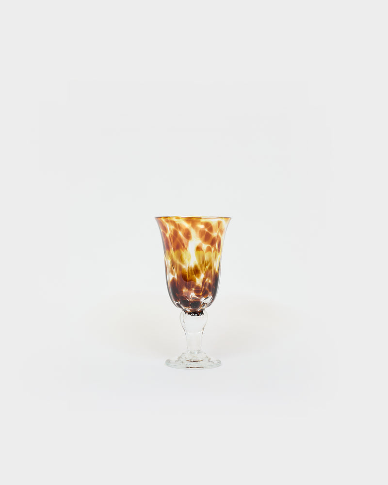 Le verre à pied terre mêlée