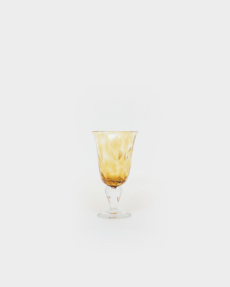 Le verre à pied terre mêlée